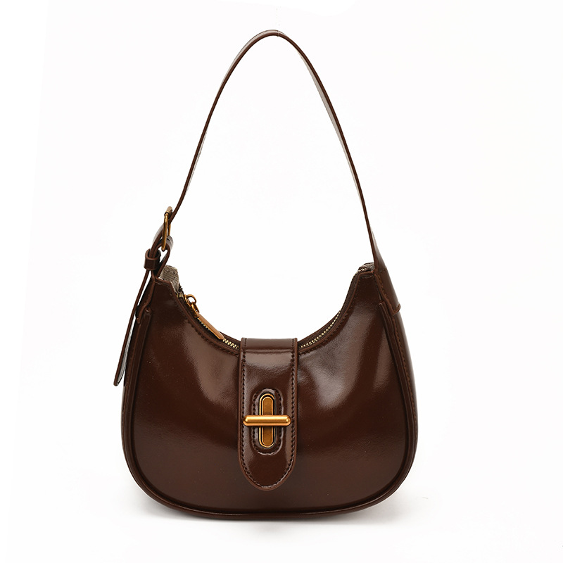 Bolso de brazo de moda de alto nivel, bolso de hombro de alta calidad, nuevo estilo de mujer 2026 simple, bolso de hombro de alta calidad, bolso de transporte universal.