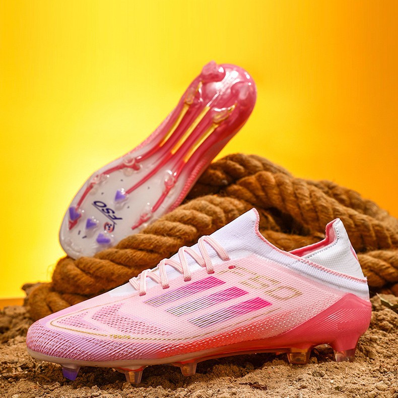 Fábrica al por mayor nuevo F50 baja zapatos de fútbol juveniles clavos de hierba zapatos de fútbol de competencia profesional