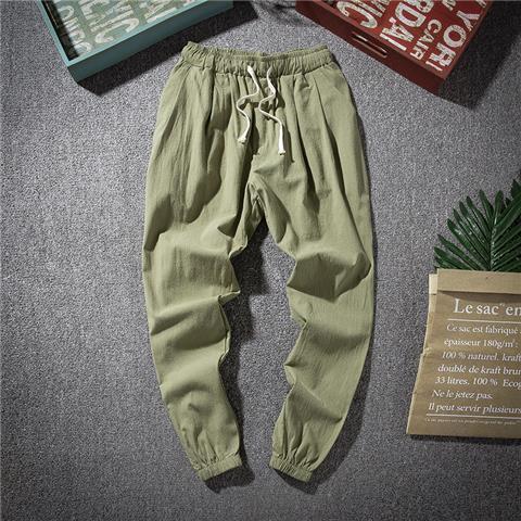 Pantalones de lino casuales para hombres de nuevo estilo con cordones sueltos de lino de algodón transpirable, tendencia juvenil, pantalones largos de talla grande de todo fósforo