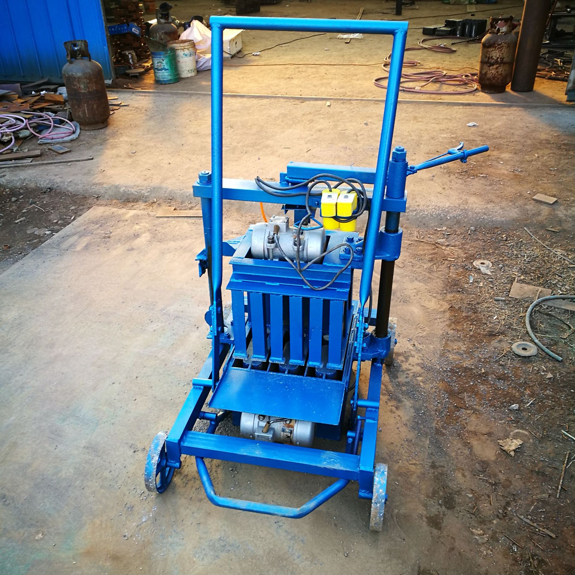 东越供应移动式制砖机推拉式水泥空心砌块砖机半自动水泥免烧砖机