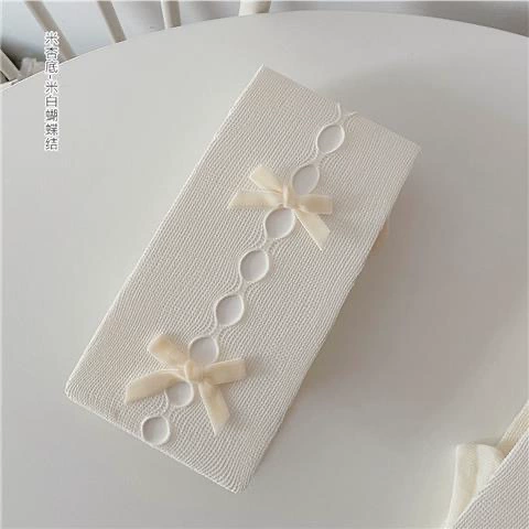 With bow, beige