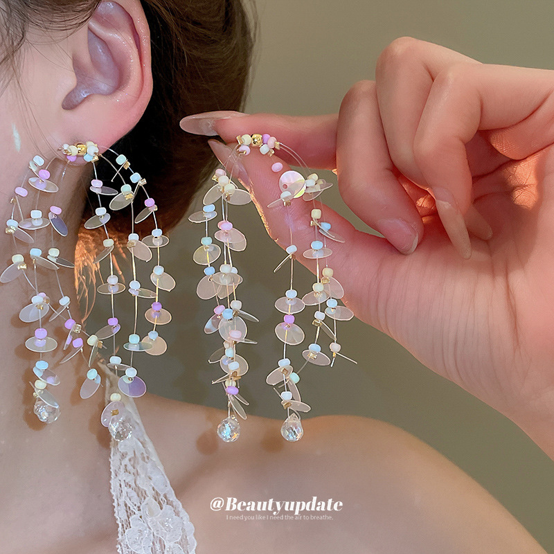 Pendientes de borla de cuentas de arroz de color de dopamina con aguja de plata Nuevos pendientes de todo fósforo Pendientes de niña dulce Sensación avanzada de nicho