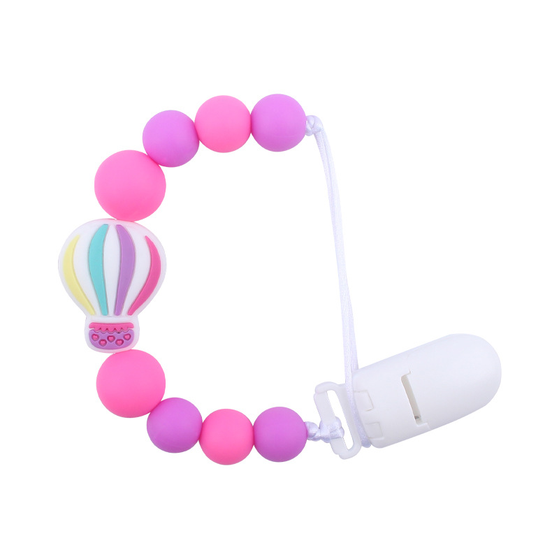 Nuevo bebé suministros chupete cadena creativa dibujos animados globo de aire caliente de silicona mordedura cadena anti-gota molar