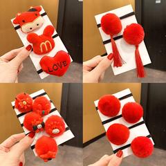 Chinese-style red plush hair accessories for little girls, holiday celebration hair bands with pom-pom hair ties