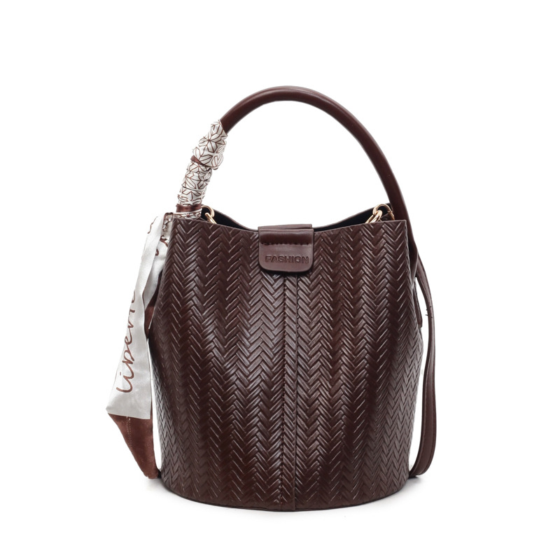 Bolso de mano transfronterizo retro simple bolso de cubo de agua mujer otoño / invierno 2025 nuevo estilo versátil bolso de hombro bolso de transporte