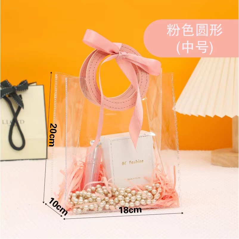 Navidad mano bolsa de regalo de la boda regreso dama de honor bebé luna llena caja de dulces de pvc transparente regalo de la mano