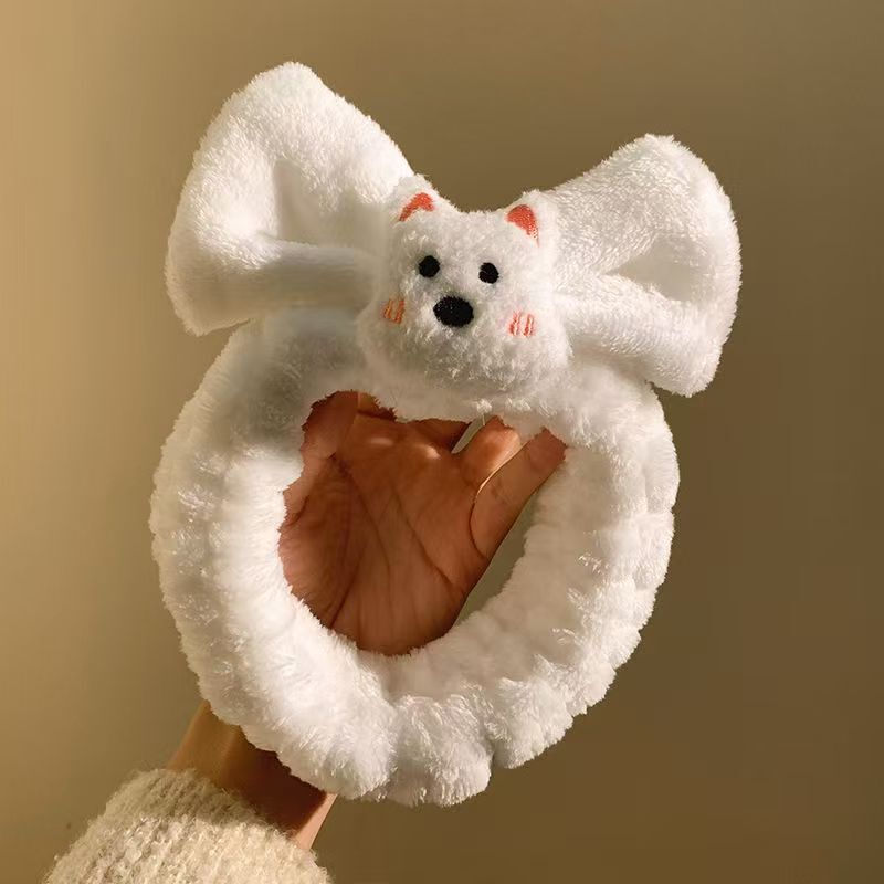 西高地の子犬のぬいぐるみのヘアバンドは顔を洗って化粧します。|undefined