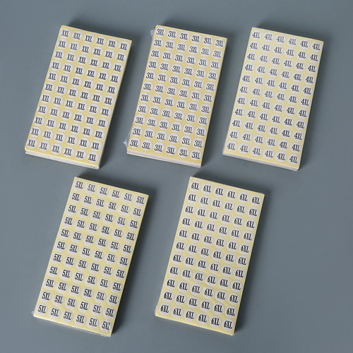 Circular white background, black text manufacturer's digital label size sticker for clothing and shoe size markings, wholesale