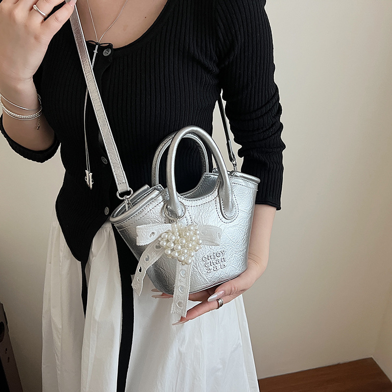 Bolso de cubo de mano de nicho de comercio exterior 2025 nuevo producto bolso de mensajero de moda casual de todo fósforo bolso de hombro de viaje de trabajo de moda