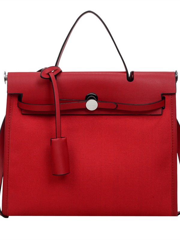 Nicho de moda portátil Kelly bolso mujer 2026 nuevo cross-border lienzo empalme color contraste viaje mochila de hombro
