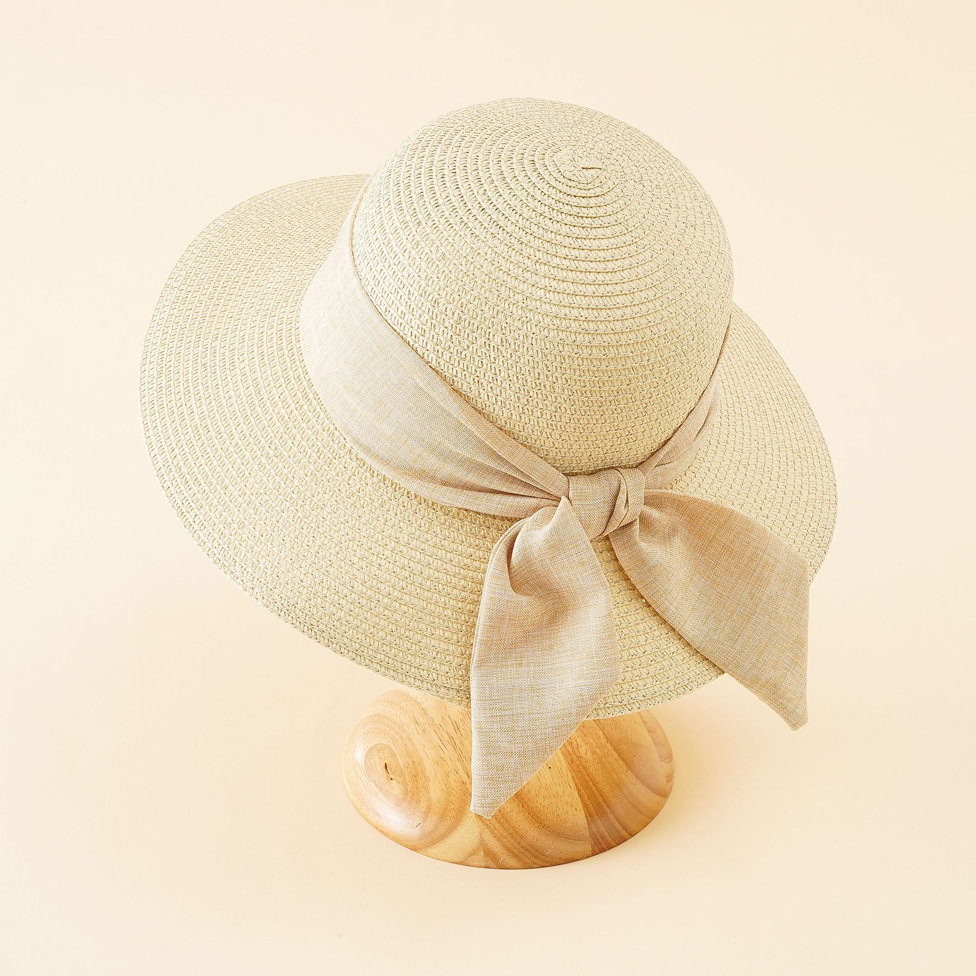 Sombrero de estilo coreano de las mujeres del verano arco sombrero para el sol sombrero de paja de playa al aire libre sombrero de sol de ala ancha