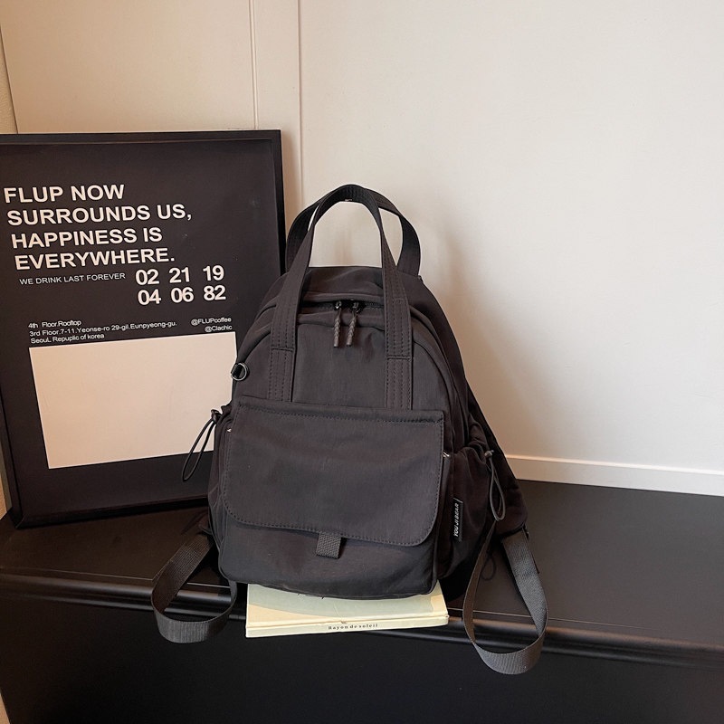 Mochila diaria nueva moda casual versátil marea de hombro femenino viaje ligero estudiantes de clase 2026
