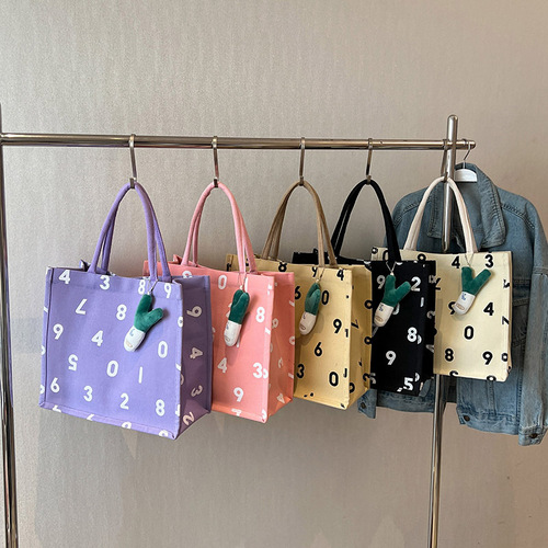 Student portable canvas commuter tote bag  fashionable casual mommy bag female ins versatile shoulder school bag