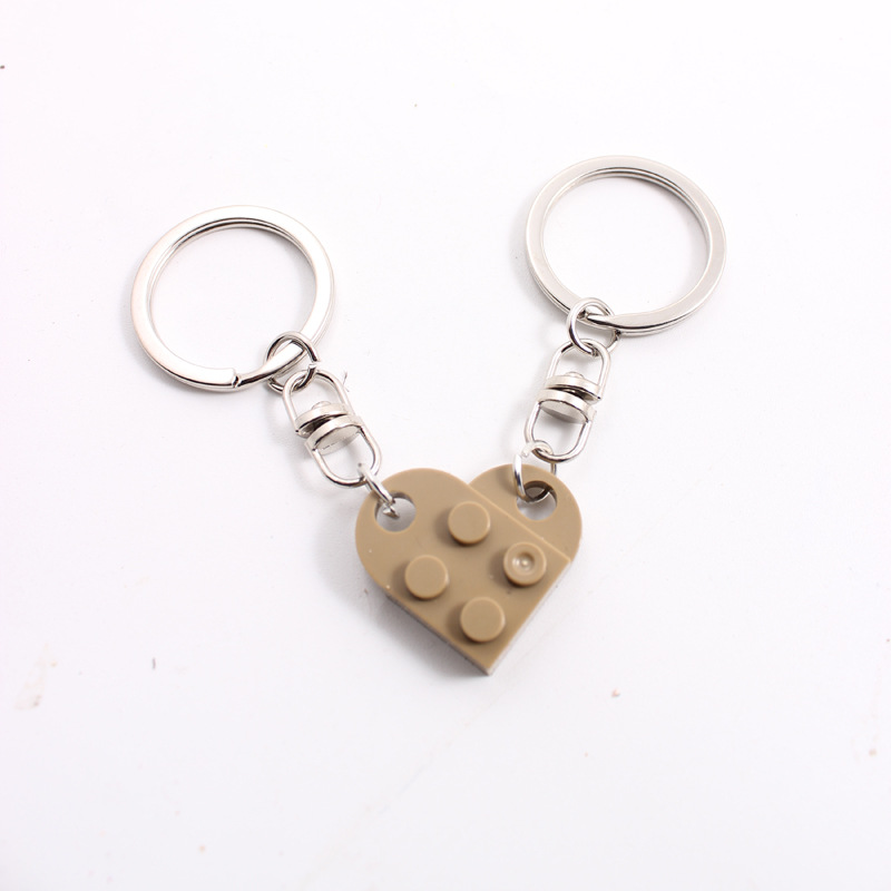 Europa y América Nueva spliced dividir bloques de construcción pareja amor llavero Comercio electrónico transfronterizo Lego rompecabezas llavero