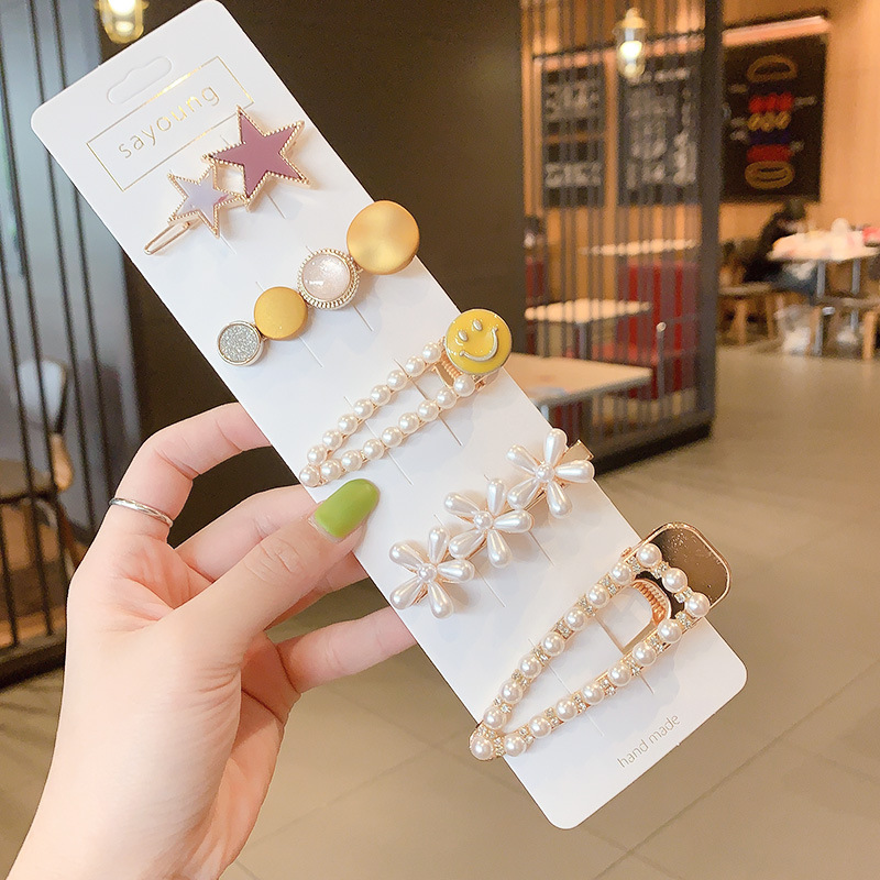 Clip de flequillo lateral rojo de la red femenina 2025 nueva horquilla simple clip de una línea horquilla clip de cabello roto tocado clip de pico de pato