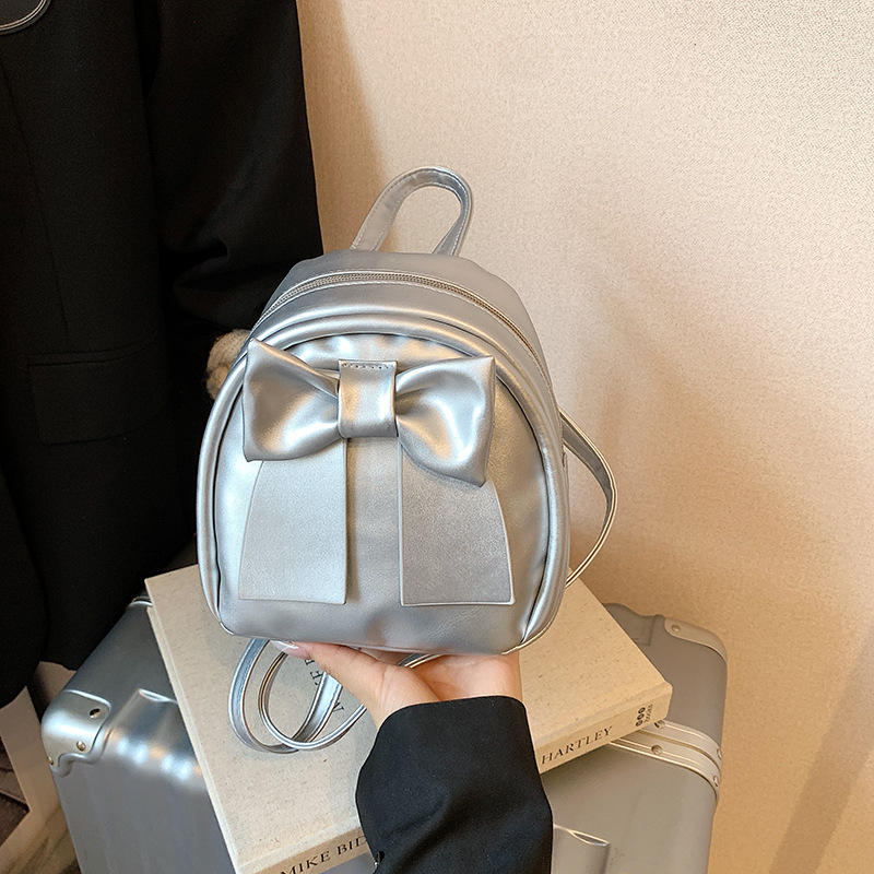 Lindo bolso pequeño con lazo simple 2025 verano nuevo estilo diseño sentido mochila pequeña moda estilo occidental mochila salvaje