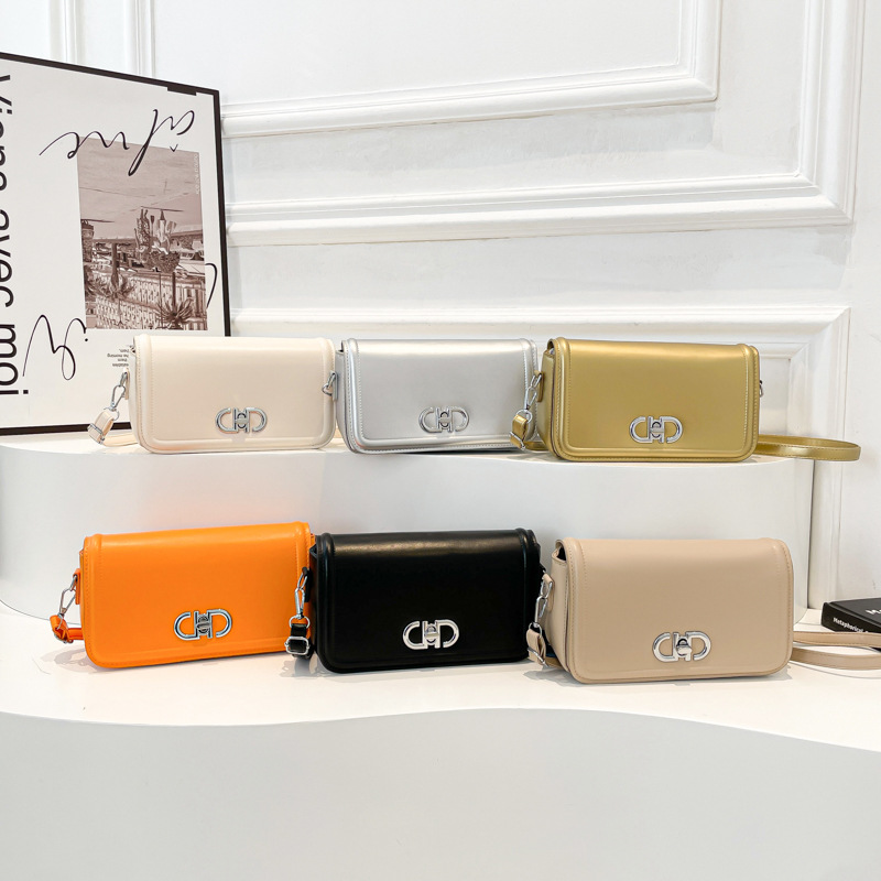 2025 primavera nuevo nicho de estilo estilo extranjero estilo de moda de color sólido bolso de bloqueo personalidad elegante bolso de hombro
