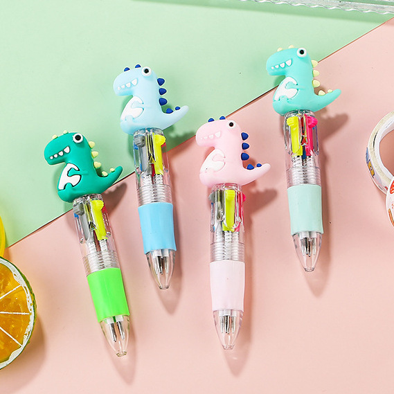 Fabricante mayorista de cuatro colores bolígrafo de silicona bolígrafo multicolor de dibujos animados cabeza portátil de estudiantes