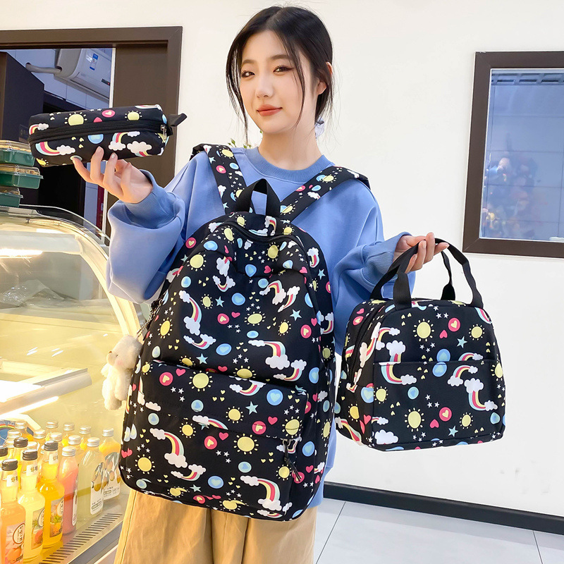 Conjunto de tres piezas de comercio exterior de mochila para estudiantes, mochila informal simple de estilo coreano, bolso para estudiantes de primaria y secundaria de gran capacidad