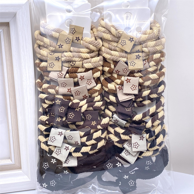 Caqui fresa oso etiqueta de tela anillo de pelo rojo leche té color 03 amor banda de goma lazo de pelo de las mujeres 2 yuanes tienda física