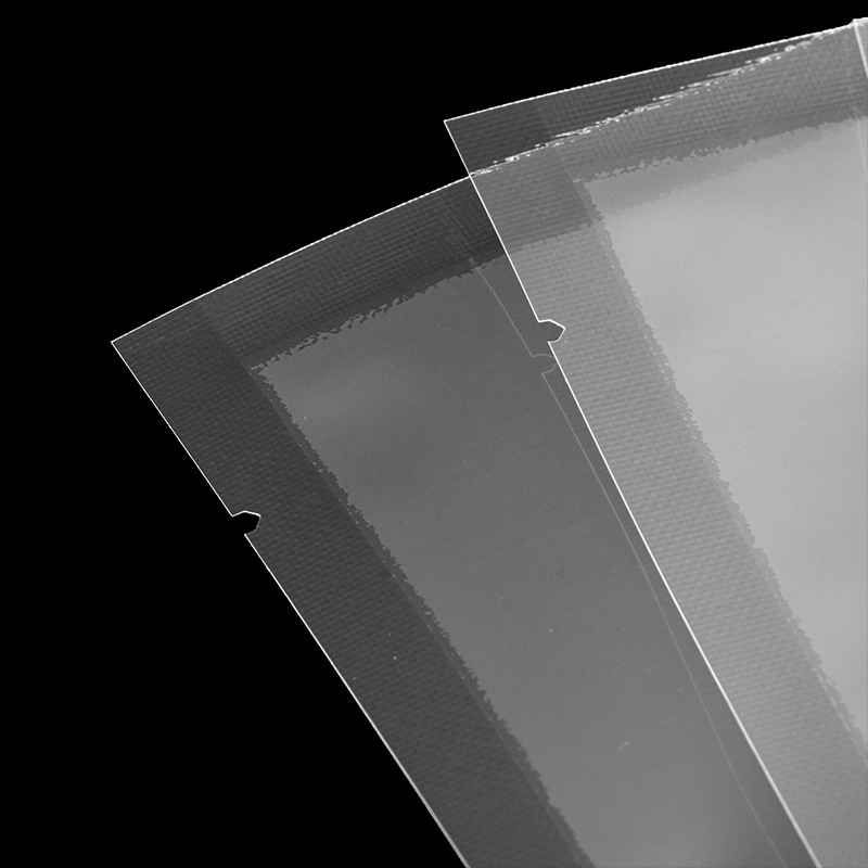 Bolsa sellada brillante Bolsa de embalaje de plástico para alimentos Bolsa de embalaje al vacío gruesa al por mayor Bolsa de plástico al vacío transparente fácil de rasgar