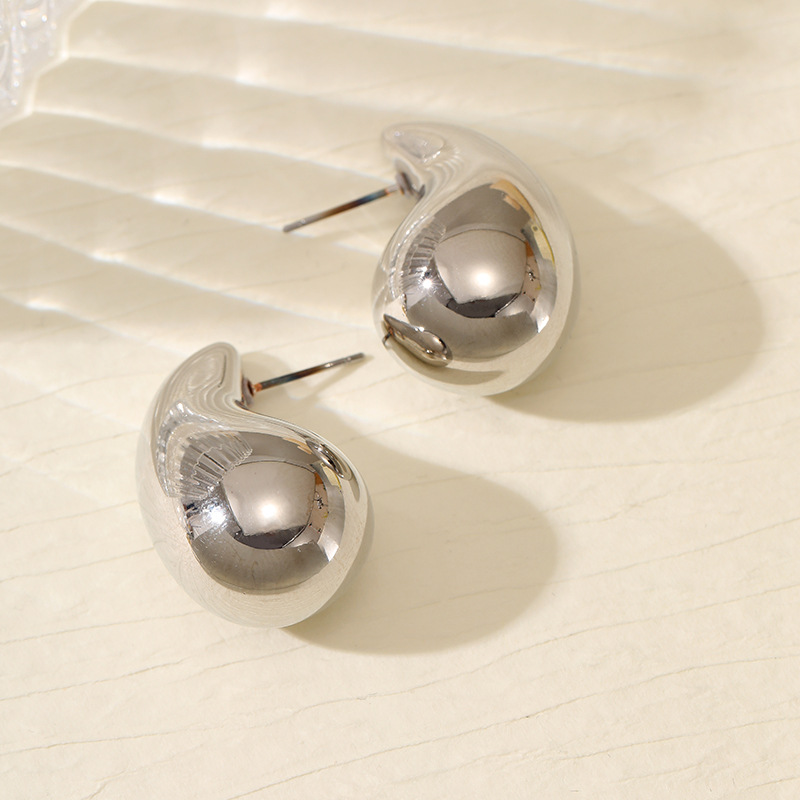 Europa y los Estados Unidos explotaron transfronterizos retro coma lágrimas punk orejas de viento decoración brillante pendientes colgantes de metal ecológico