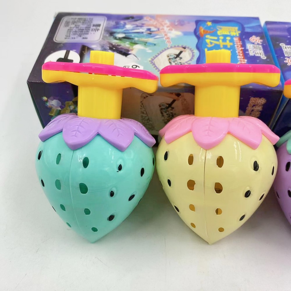 Dibujos animados de fresa luminosa Gyro lanzamiento juguete puesto juguete venta al por mayor mercado nocturno cantina suministro regalo rotación