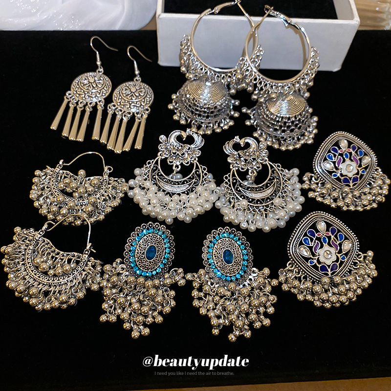 Pendientes geométricos de diamantes súper parpadeantes de estilo étnico Pendientes de lujo ligero de nicho retro Personalidad Accesorios de pendientes de alta gama