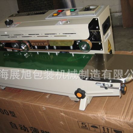 供应展旭牌连续式封口机，连续封口机，塑料封口机。