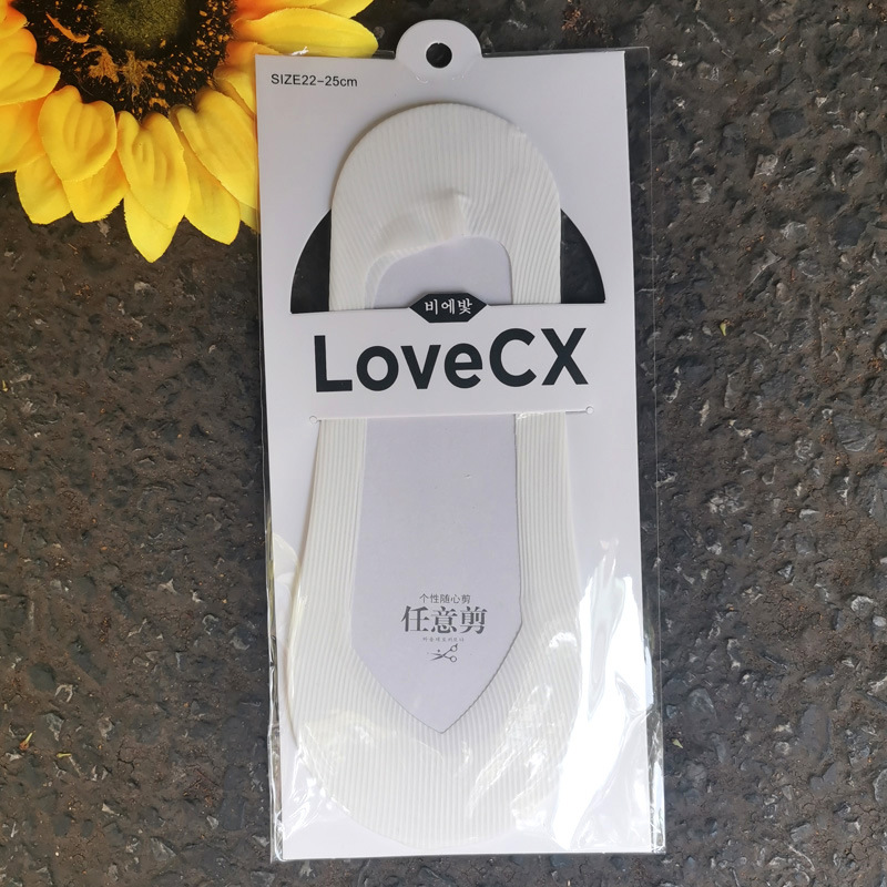 Verano de las mujeres nuevo corte arbitrario de hielo de seda de silicona antideslizante calcetines invisibles de color sólido sin costuras de las mujeres calcetines de barco de corte bajo al por mayor