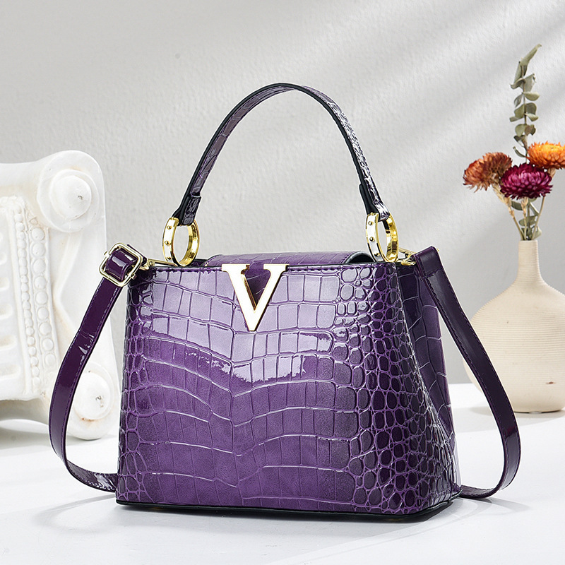 Patrón de cocodrilo de charol 2025 nuevo bolso de moda bolso de cubo de mediana edad bolso de mensajero de hombro para mujer madre degradada