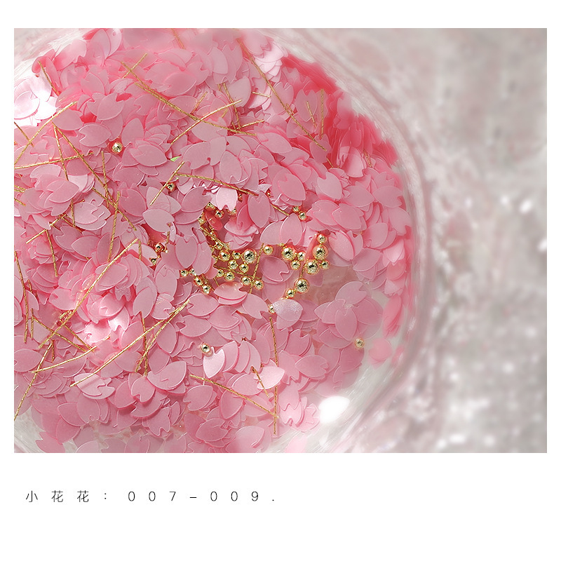 Super Hada pétalo lentejuelas bola de acero hilo de seda material paquete joyería Tiktok red nail art Cerezo flor lentejuelas Aurora