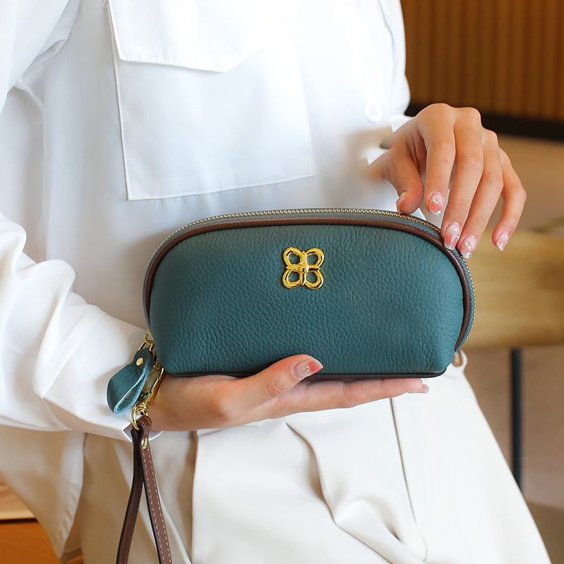 Mobile phone bag 2023 new leather female bag small bag niche fashion senior sense temperament bag design clutch bag