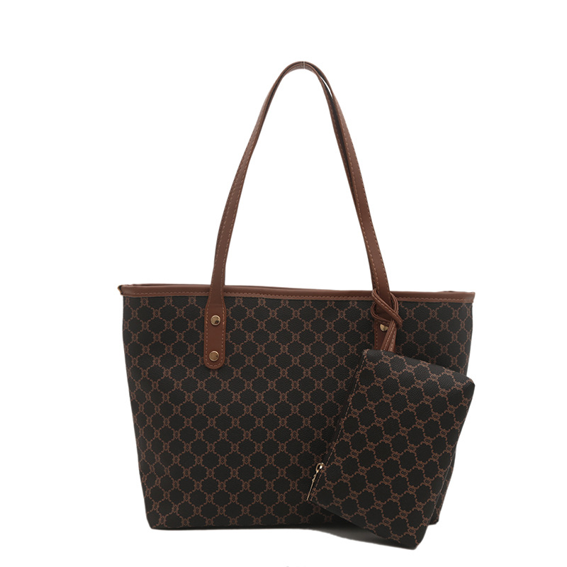 Bolso de alta calidad de gran capacidad 2025 nuevo bolso de viaje de todo fósforo de nicho para mujer bolso de niño de moda para mujer bolso portátil para mujer