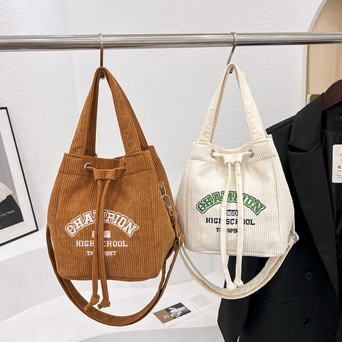 Niche design nylon women's bag college style large capacity bucket bag texture fashion portable shoulder bag wholesale