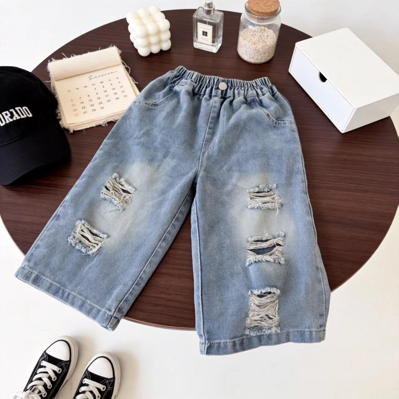 Personalidad extranjera para niños coreanos agujeros jeans para hombres y mujeres bebés coreanos pantalones rectos sueltos pantalones de moda primavera y otoño image 4
