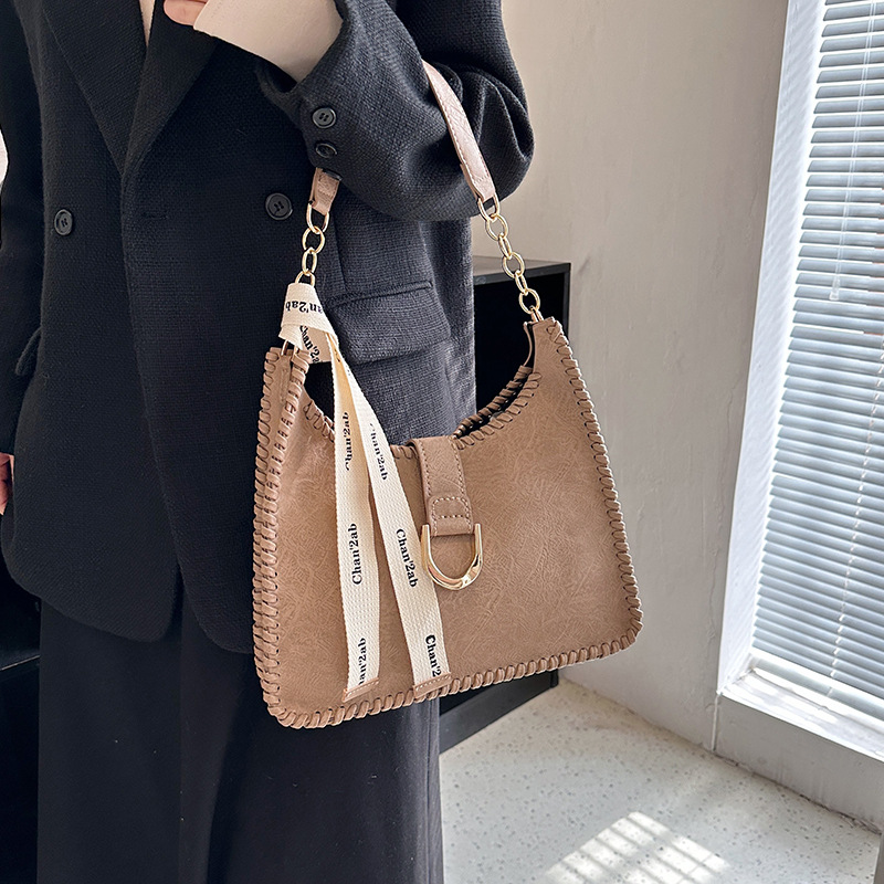 Bolsa de material de estilo británico bolsa de axilas de Superficie suave DIY hecho a mano tejida bolso diseño sentido no colisión solo bolso de hombro