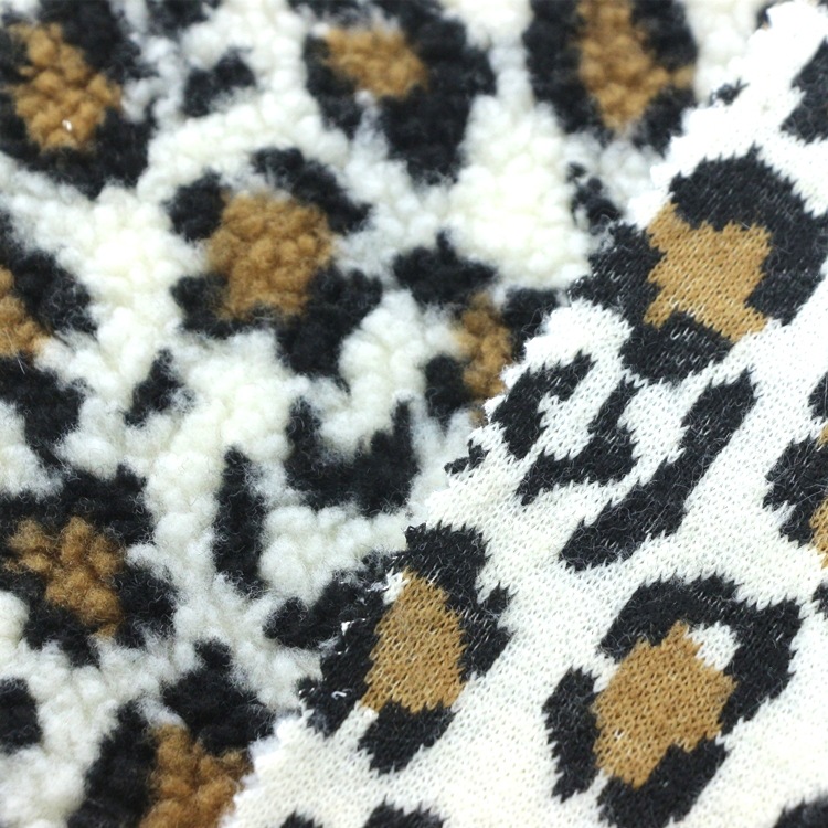 色织提花羊羔毛绒布全涤仿毛皮加厚颗粒泰迪绒豹纹提花羊羔绒布料