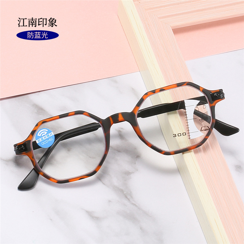 オーダーメードのファッションのレトロな多焦点の老眼鏡の男性の青い光の花の鏡の女性の高清の読書鏡の卸売りの老眼鏡