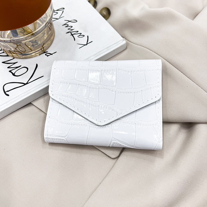 Personalidad textura casual tendencia simple bolsas de cena de color sólido de mujeres lápiz labial de moda de color sólido impresión bolsa de mano universal