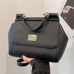 2025新型国境を越えた通勤バッグ女性の高級感ファッションは、肩を斜めに掛けてハンドバッグを包む女性のバッグを包む