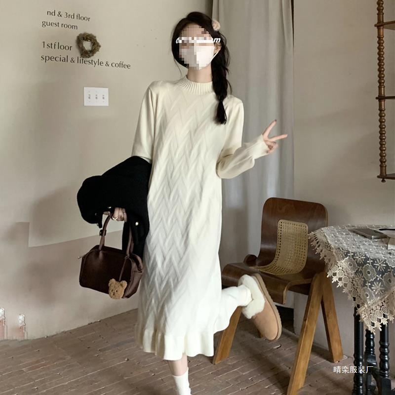 White colored knitted sweater