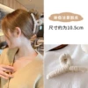 Beige crab pin, 38