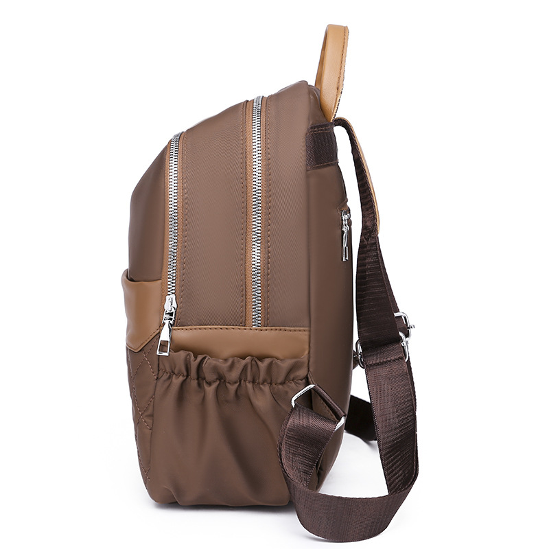 Mochila de nailon para mujer 2022 nueva mochila casual para mujer mochila de viaje de arte simple mochila escolar de moda al por mayor