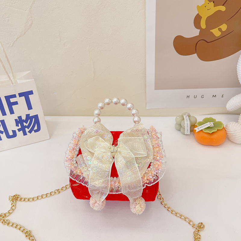 Bolso infantil de perlas 2024 nueva chica arco de moda, bolsa de tramo inclinada, princesa de moda, accesorios de algodón y lino, bolso