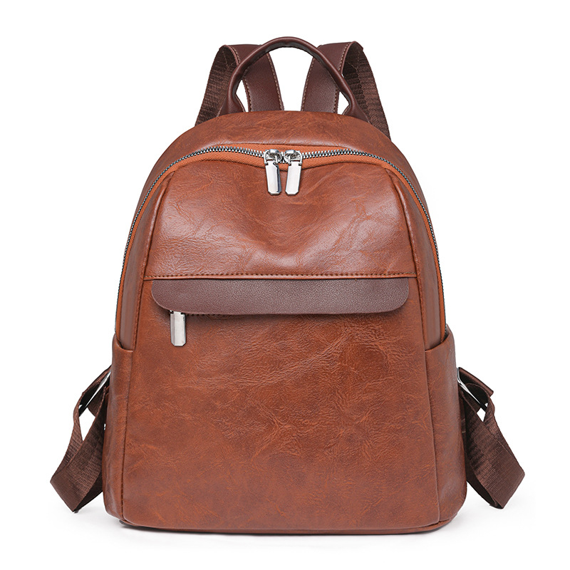 Mochila casual de cercanías 2024 nueva moda simple de gran capacidad para salir bolso de mujer de todo fósforo bolso de estudiante de cuero suave