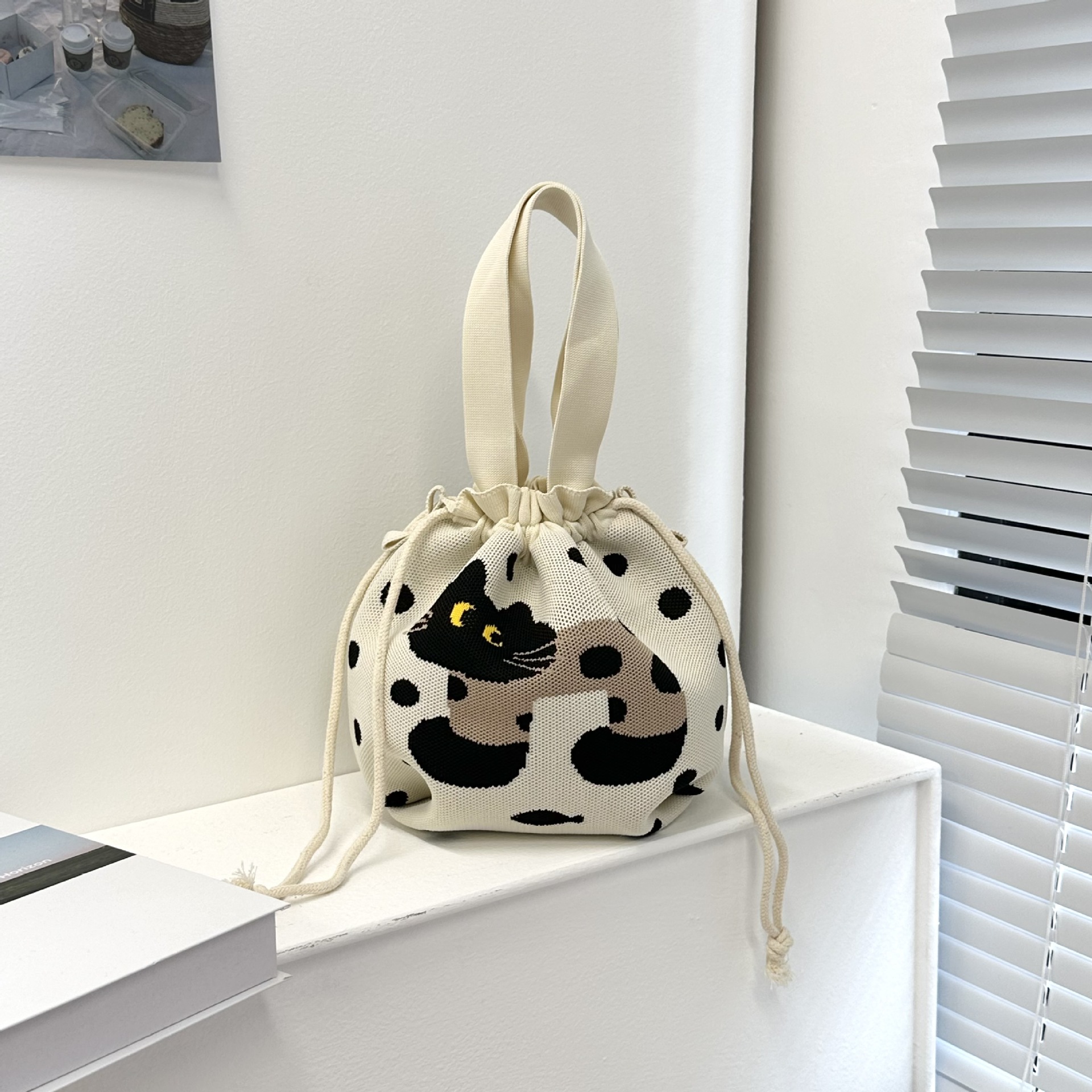 Bolsa de cinturón versátil nuevo patrón de dibujos animados nicho lindo bolso de arroz de almuerzo de cuerda bolso de cubo de mano bolso de brazo