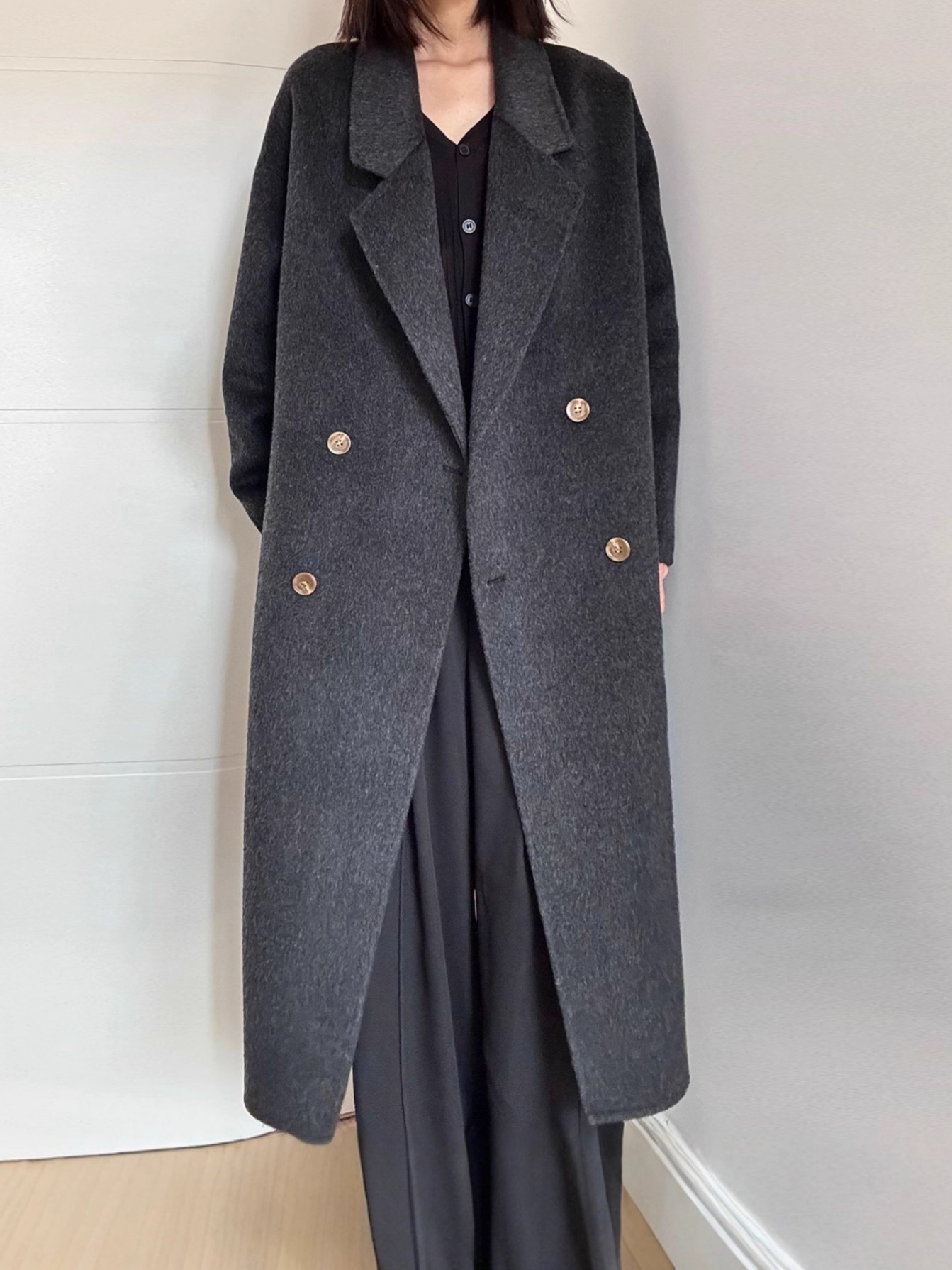 背の高い【韓系の怠惰でシンプルな繭型】ハイエンドの韓国版の通勤両面のウールの女性の長いタイプの毛のコートです。