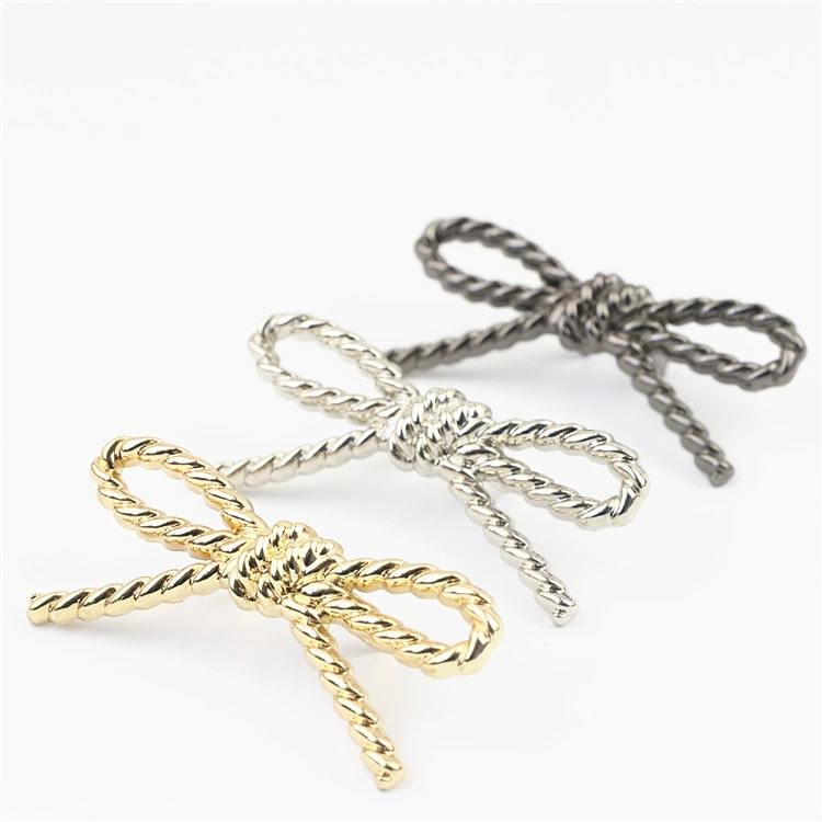 Metal bag accessory with pigtail, footwear buckle with bow, shoes, decorations