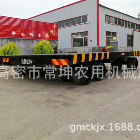 60吨重型平板拖车    前四后八1实心轮胎   左右浮动型车桥